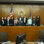 image of interns with judge