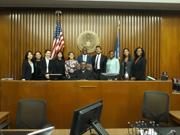 image of interns with judge